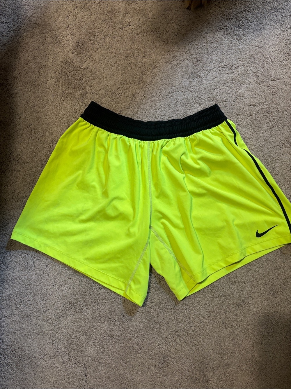 Nike Women's High-Visibility Neon Yellow Athletic Shorts with Black Waistband